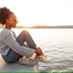 african american woman relaxing smiling side-view-woman-looking-water