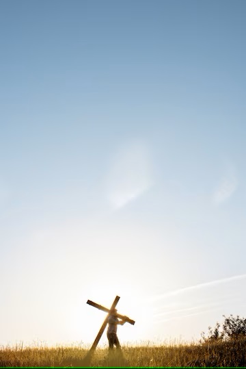 Man carrying a cross
